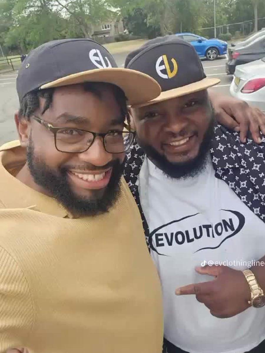 EV Clothing navy cap with faux suede peak and embroidered logo